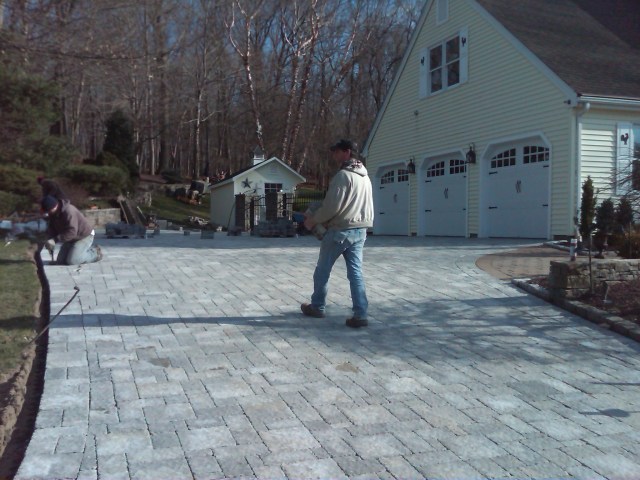 Preferred putting the finishing touches on this awesome job of pavers