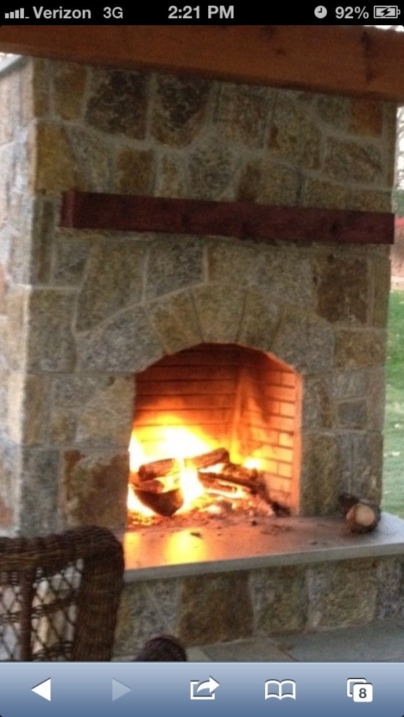 Outdoor living beyond the walls of your home fabulously begins with a fabulous stone fireplace to anchor family and friends 