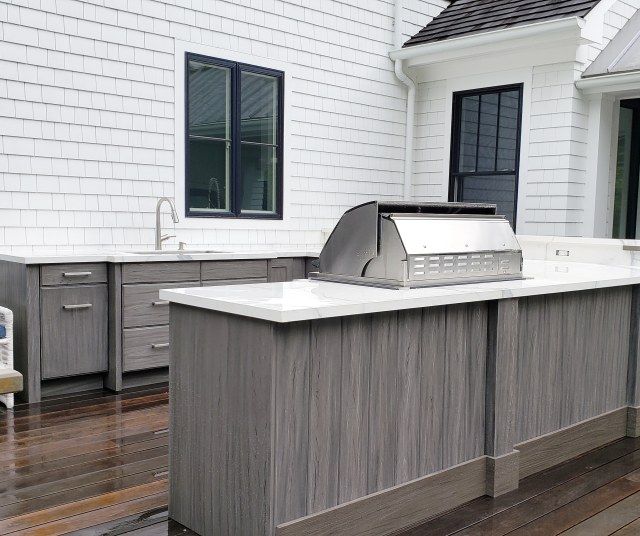 The U shaped Outdoor Kitchen works well for family and friends.
